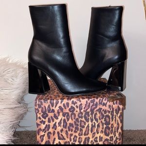 black heeled boots